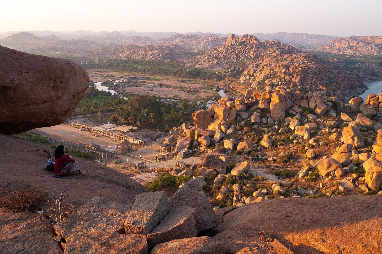 Granite boulders of Matanga Hill above the ruins of Hampi in evening light